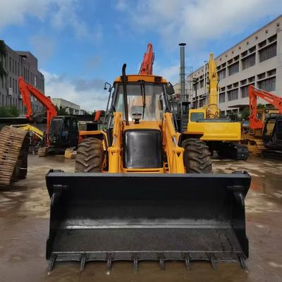 JCB 4CX буровой погрузчик вторых рук энергосберегающий с высокой мощностью